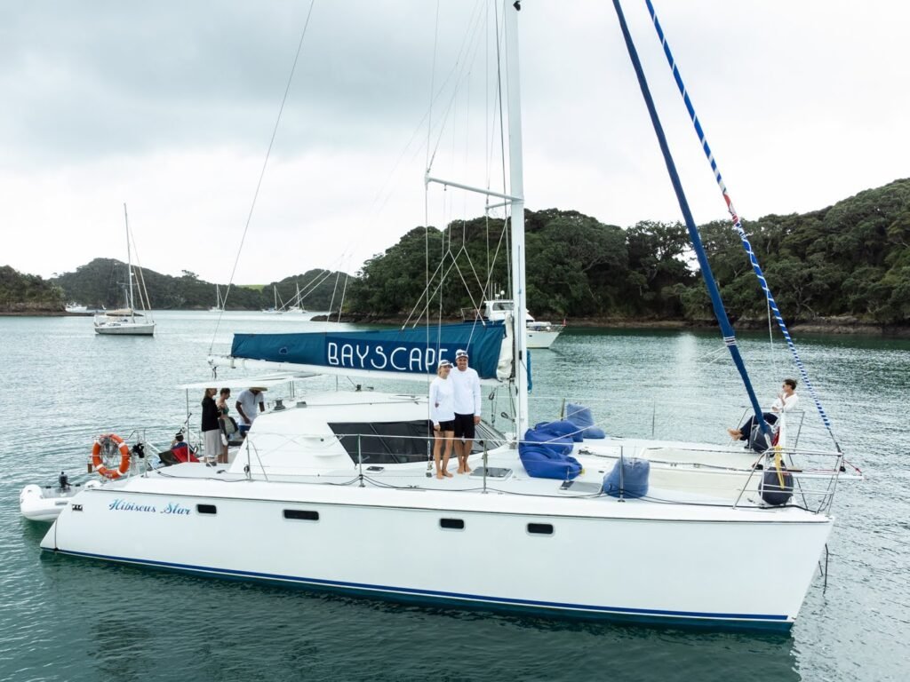 Bayscapes Charters crew Brad and Monique sailing in the Bay of Islands